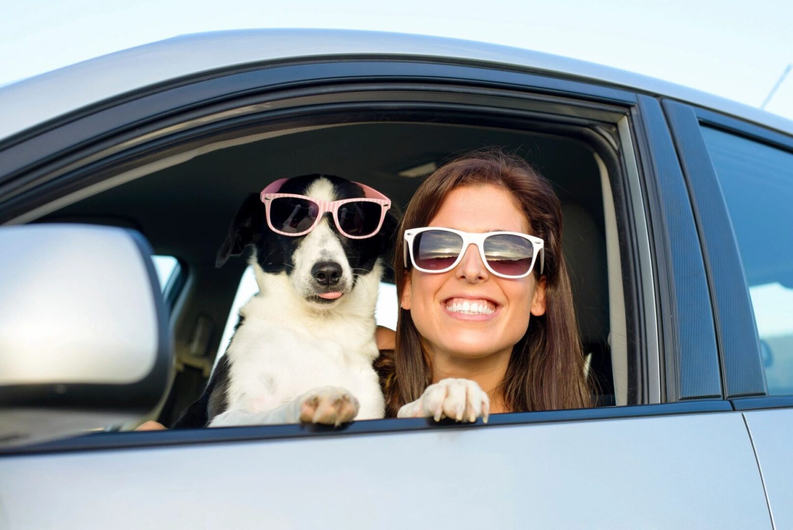 Lady and dog wearing sunglasses